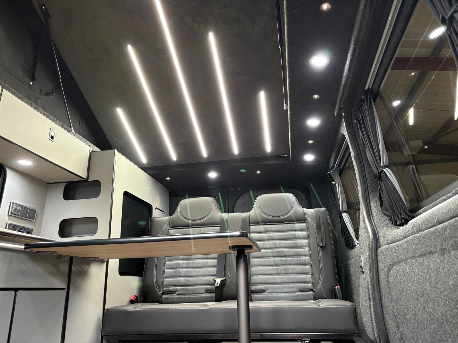 Lulu campervan interior with LED ceiling lights and power sockets